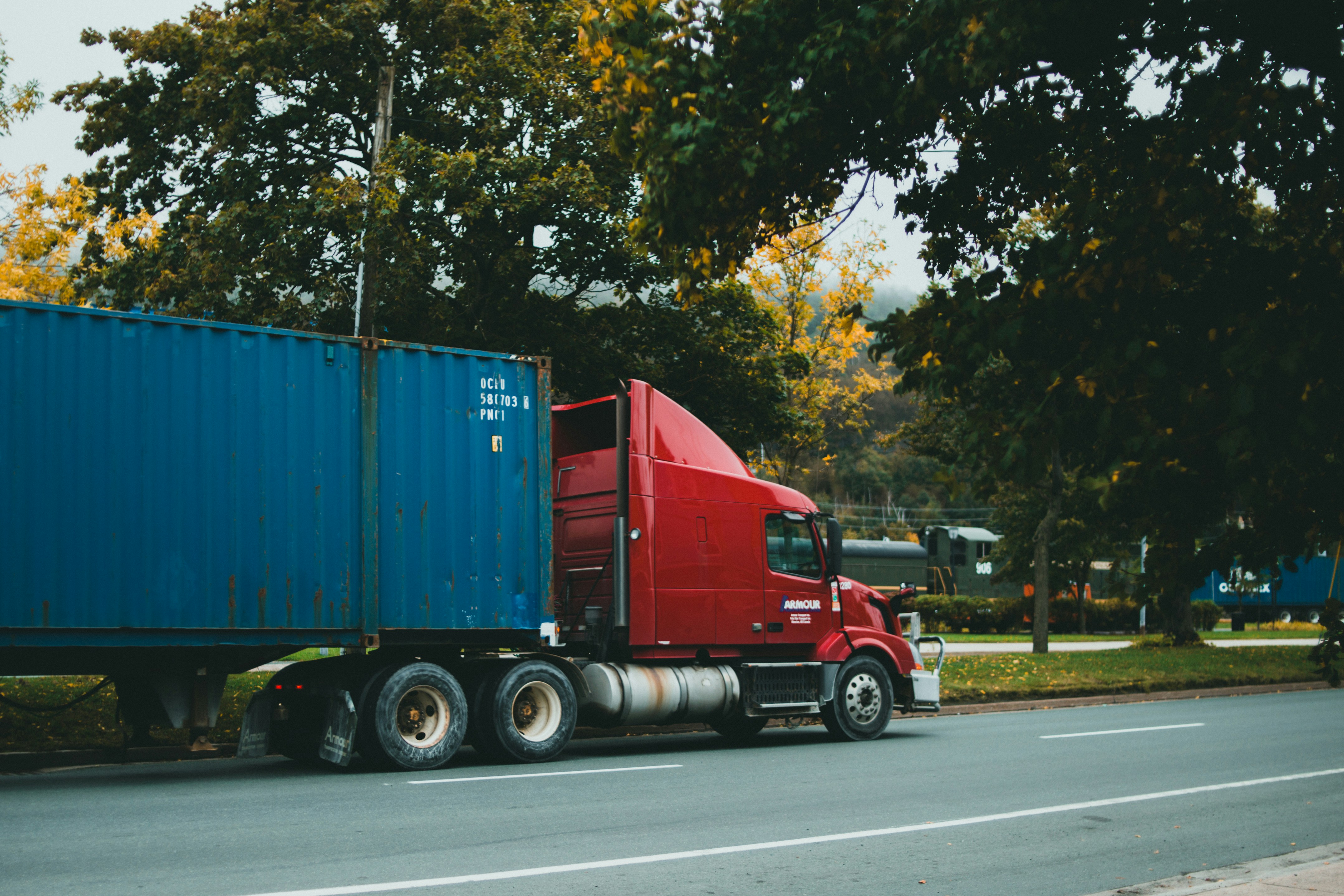 Jeroplogistics white semi-truck on Nigerian highway demonstrating long-distance freight capabilities
